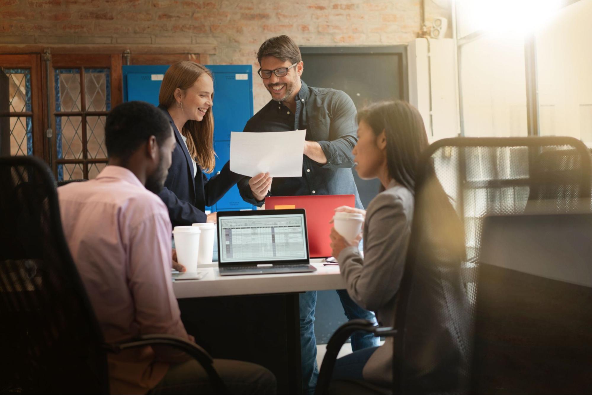Group of colleagues working in modern office space