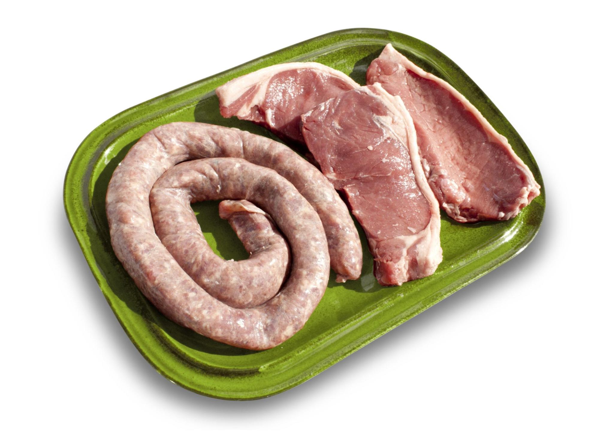 Raw tradional south african boerewors and two steaks Raw tradional south african boerewors and two steaks