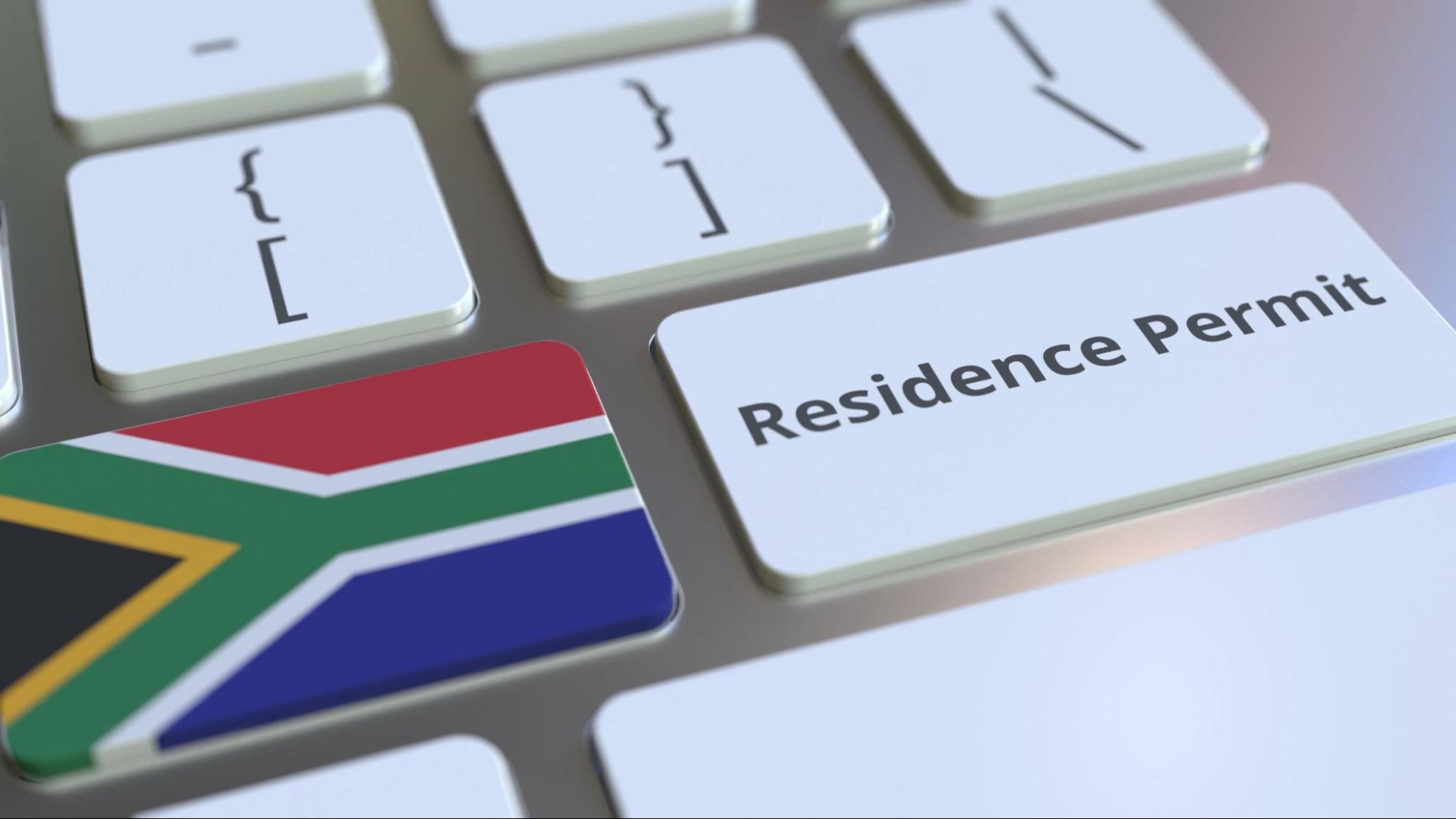Residence Permit and flag of South Africa
